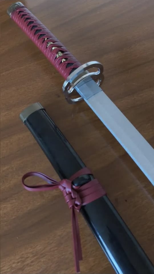 Vaina negra con cordón rosa